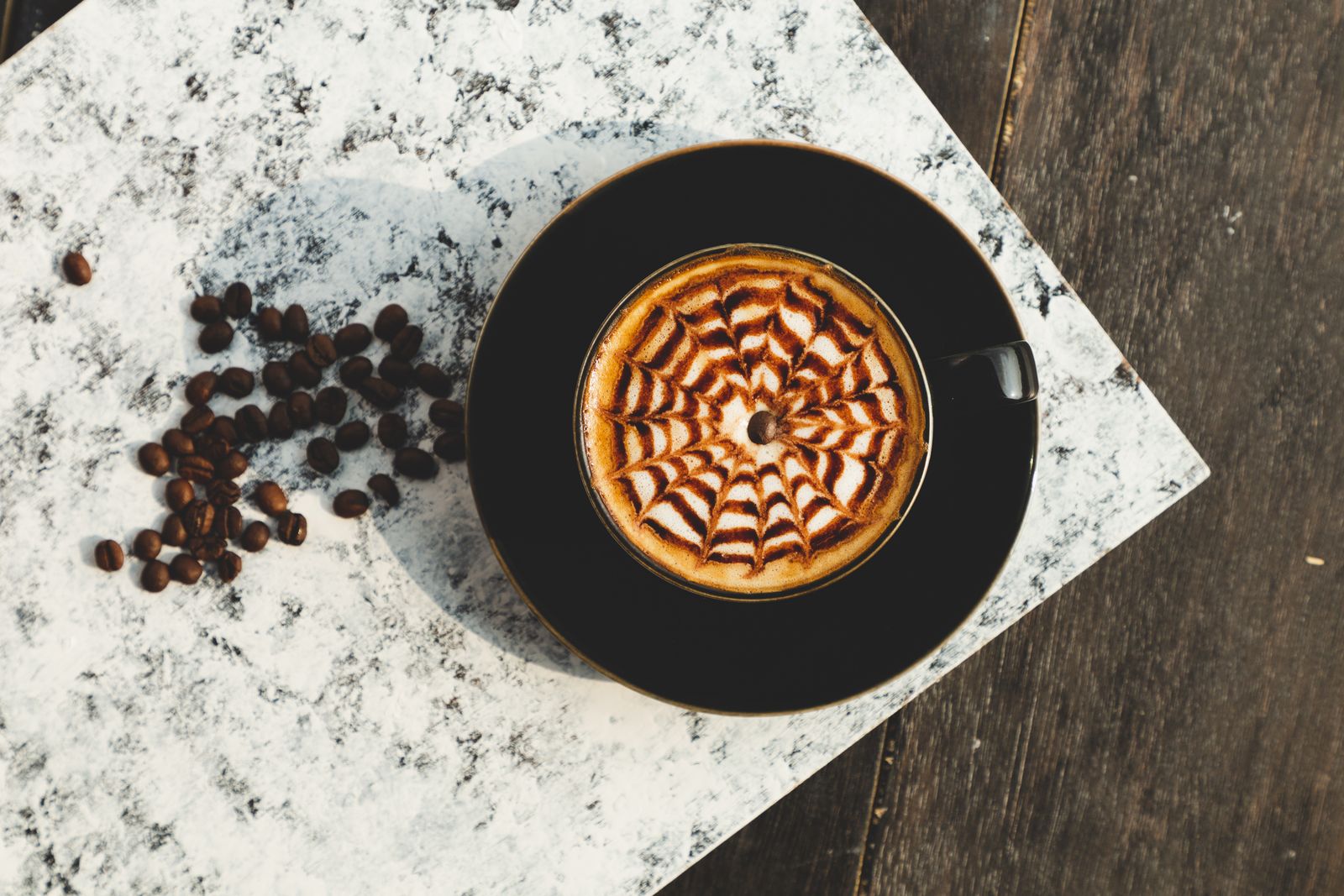 Before: an uncropped coffee photograph on marble